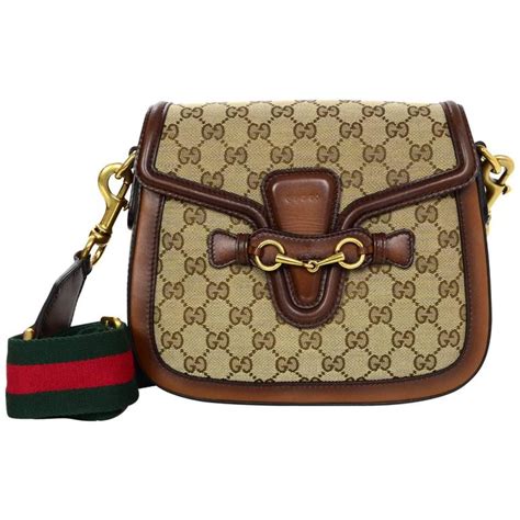 gucci brown leather crossbody bag|Gucci monogram crossbody bag.